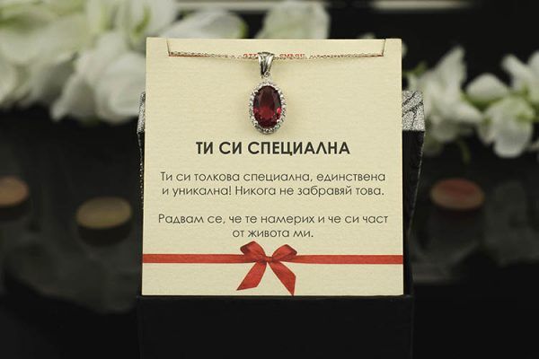 Сребърно колие с голям рубин и цикони